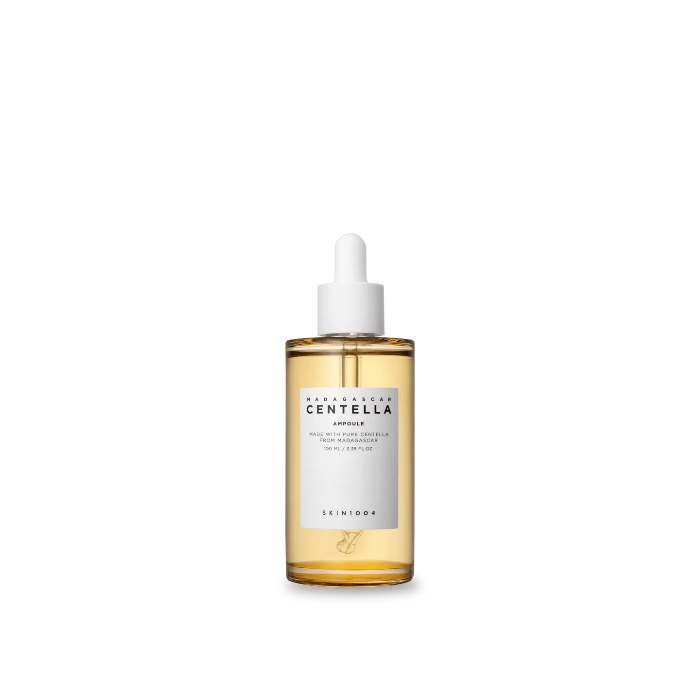 Skincare serum bottle with a white cap on a white background