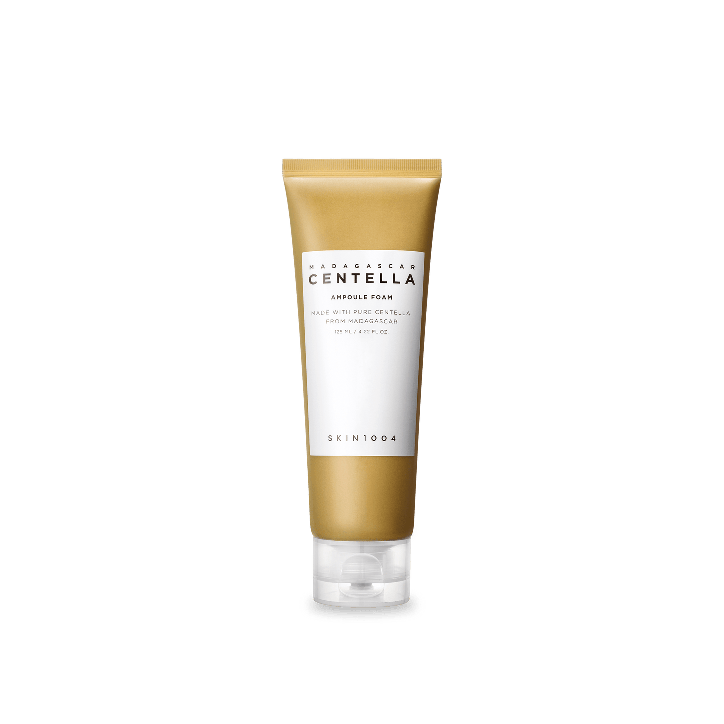 Skincare tube with gold and white design on a green background