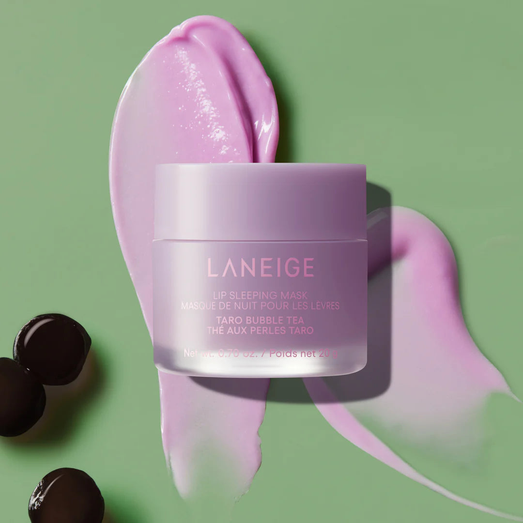 Laneige lip sleeping mask with a pink lid on a green background