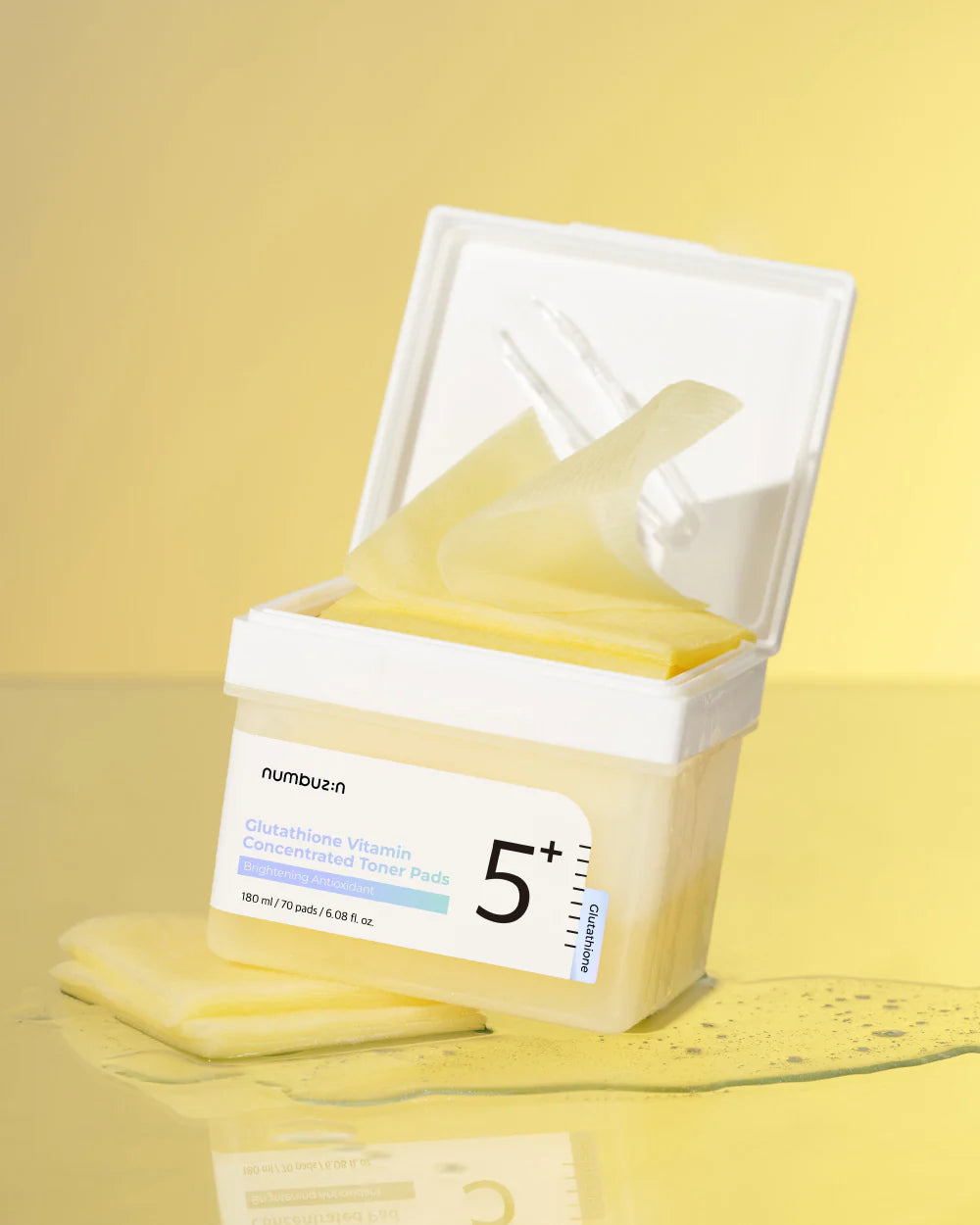Packaging of humburt+ skincare product on a yellow background