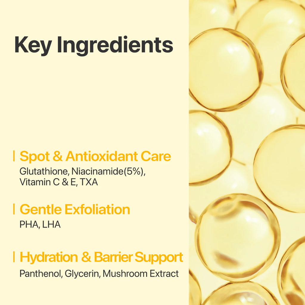 Key ingredients of a skincare product with oil droplets on a beige background