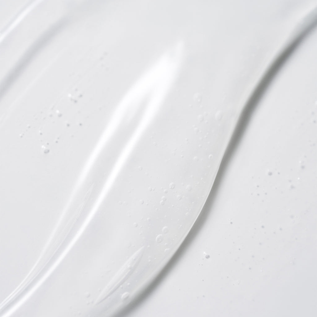Close-up of a white ceramic plate with subtle texture