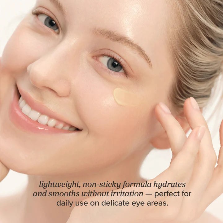 Woman applying cream under eye with text about product benefits
