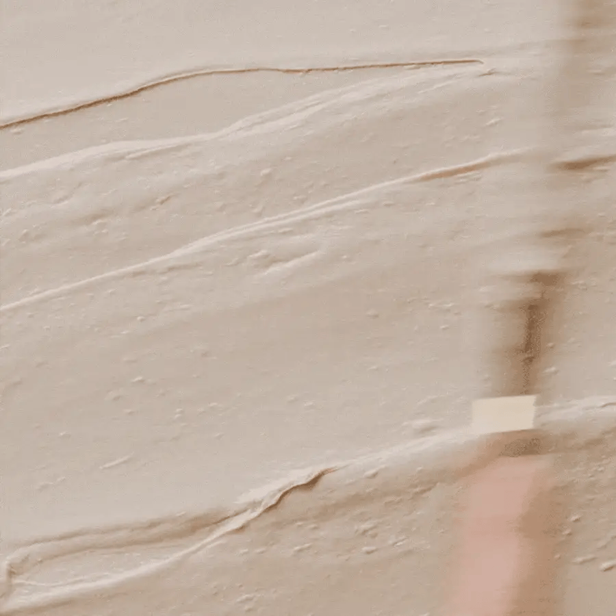 Close-up of beige tiles with a subtle pattern